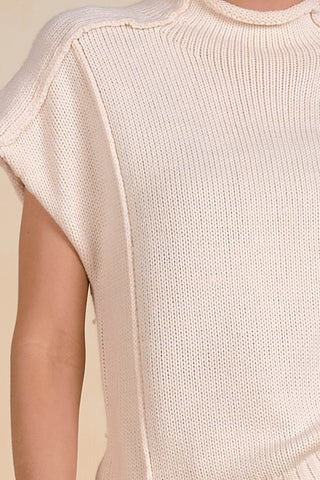 Short-Sleeve Exposed-Seam Sweater Top